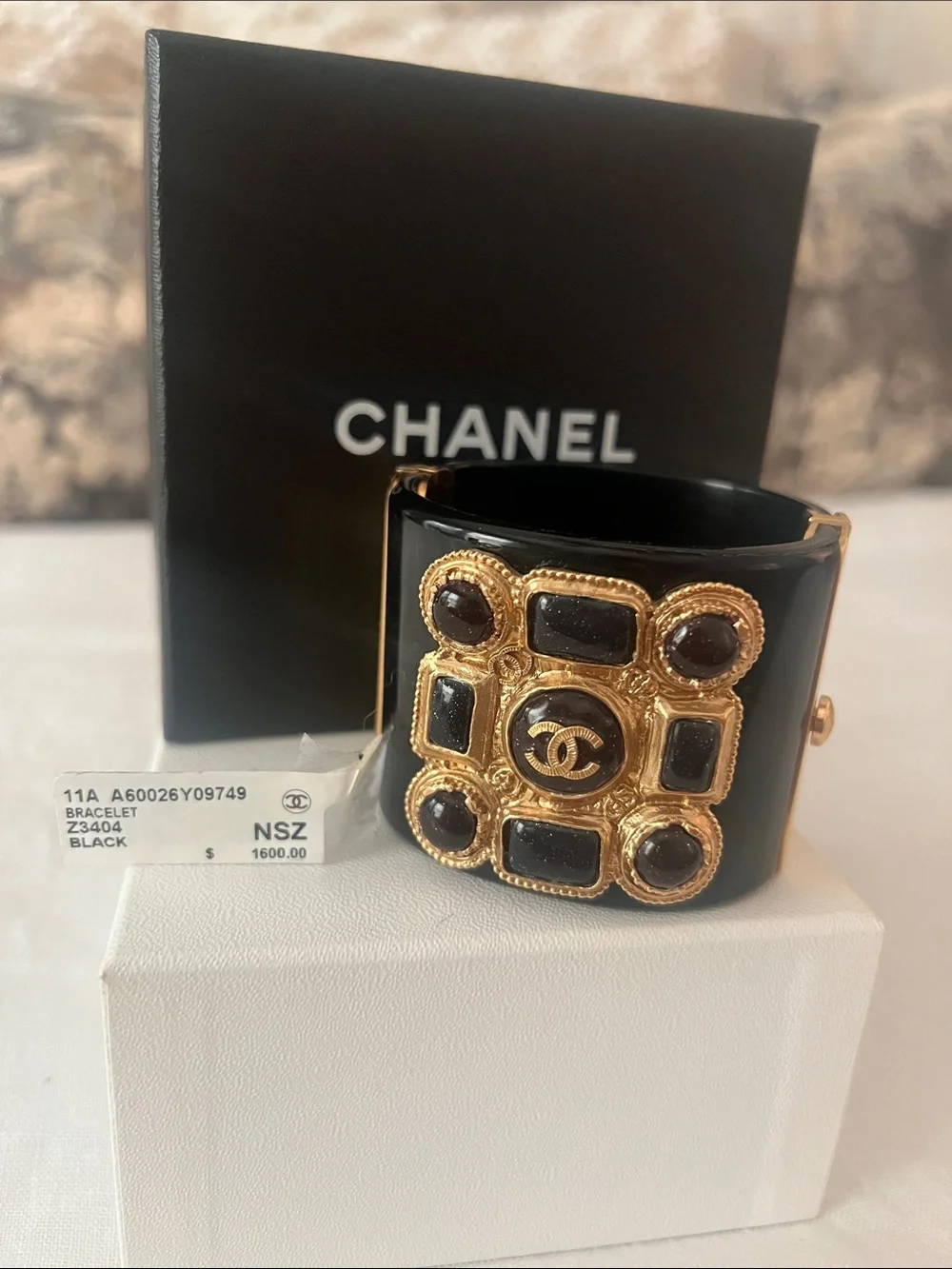 CHANEL 2011 Karl Lagerfield era Black Resin Cuff Bracelet with Gold CC Medallion